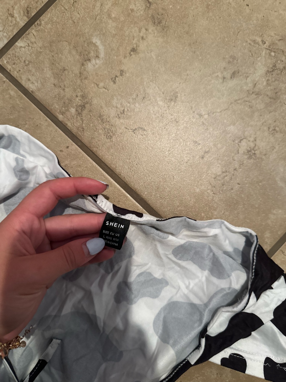 COW PRINT HALTER TOP - Picture 2 of 5